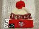 San Francisco 49ers New Era 2023 Sideline Historic Pom Cuffed Knit Hat Beanie