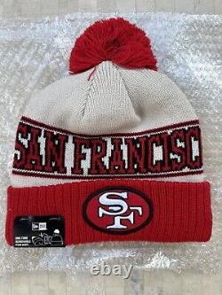 San Francisco 49ers New Era 2023 Sideline Historic Pom Cuffed Knit Hat Beanie